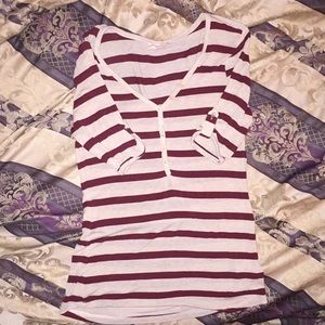 Red and cream colored elbow length blouse